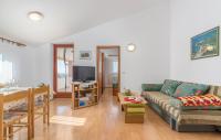 Televízia a/alebo spoločenská miestnosť v ubytovaní Apartments Ulika