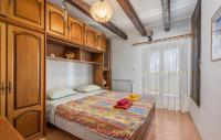 Posteľ alebo postele v izbe v ubytovaní Apartments Ulika