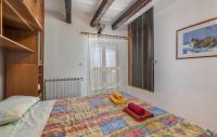 Posteľ alebo postele v izbe v ubytovaní Apartments Ulika