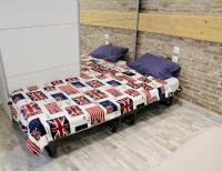 A bed or beds in a room at George Studio
