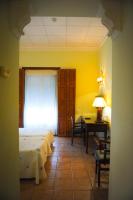 Postel nebo postele na pokoji v ubytování Hotel Victoria