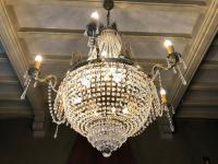 a large chandelier hanging from a ceiling at Chambres d&#39;hôtes Manoir Ker-Huella in Morlaix