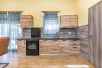 Kuchyňa alebo kuchynka v ubytovaní Apartmani Monte