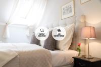 Postel nebo postele na pokoji v ubytování Boutique Hotel U Solné brány