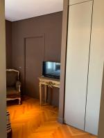 Televízia a/alebo spoločenská miestnosť v ubytovaní Pattini Guest House