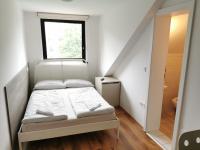 Postel nebo postele na pokoji v ubytování Rooms Ambrožič