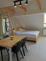 Postel nebo postele na pokoji v ubytování Apartmány Slunce