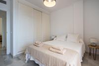 Postel nebo postele na pokoji v ubytování Sur Suites Torremolinos