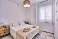 Postel nebo postele na pokoji v ubytování Sur Suites Torremolinos