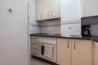 Kuchyň nebo kuchyňský kout v ubytování Sur Suites Torremolinos