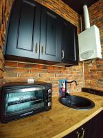 Kuchyňa alebo kuchynka v ubytovaní LOFT 57 CENTRUM