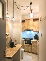 A kitchen or kitchenette at Stefanias sunny Acropolis Studio on Drakou pedestrian