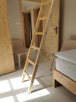 Postel nebo postele na pokoji v ubytování Apartmány Slunce