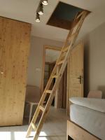 Postel nebo postele na pokoji v ubytování Apartmány Slunce