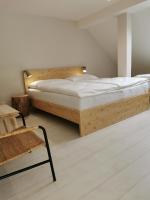 Postel nebo postele na pokoji v ubytování Apartmány Slunce