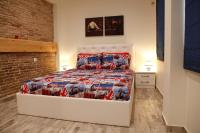 A bed or beds in a room at George Studio