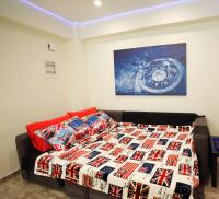 A bed or beds in a room at George Studio