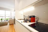Kuchyň nebo kuchyňský kout v ubytování Gran Via Suites