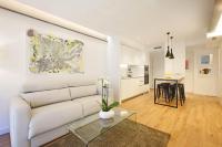 Kuchyň nebo kuchyňský kout v ubytování Gran Via Suites