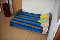 A bed or beds in a room at Pedra da Lan - una casita de piedra