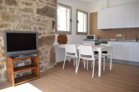 A kitchen or kitchenette at Pedra da Lan - una casita de piedra