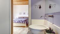 Posteľ alebo postele v izbe v ubytovaní Agriturismo Ronchi Rò