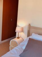 Ein Bett oder Betten in einem Zimmer der Unterkunft Villa Agrippa