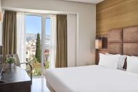 Posteľ alebo postele v izbe v ubytovaní Arion Athens Hotel