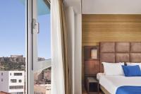 Posteľ alebo postele v izbe v ubytovaní Arion Athens Hotel