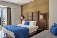 Posteľ alebo postele v izbe v ubytovaní Arion Athens Hotel