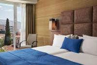 Posteľ alebo postele v izbe v ubytovaní Arion Athens Hotel