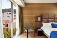 Posteľ alebo postele v izbe v ubytovaní Arion Athens Hotel