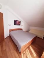 Posteľ alebo postele v izbe v ubytovaní Apartments Izabela Mužić-Fornarić Cres