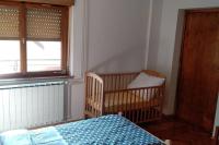 Postel nebo postele na pokoji v ubytování ZRM center