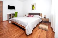 Posteľ alebo postele v izbe v ubytovaní Apartments Euphemia