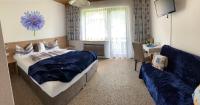 A bed or beds in a room at Pension Seeheim