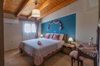 Posteľ alebo postele v izbe v ubytovaní Nefeli seaview apartment
