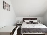 Postel nebo postele na pokoji v ubytování Apartment Asgard