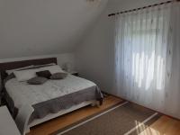 Postel nebo postele na pokoji v ubytování Apartment Asgard