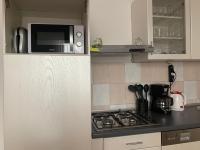 Kuchyň nebo kuchyňský kout v ubytování Apartmani Spomenka