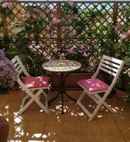A patio or other outdoor area at Alghero Roof Garden
