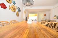 A seating area at 70sqm private terrace in front of the sea & 107sqm brand new apartment