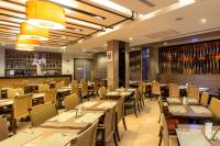 En restaurant eller et andet spisested på Mida Hotel Don Mueang Airport