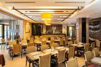 En restaurant eller et andet spisested på Mida Hotel Don Mueang Airport