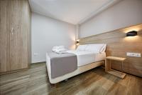 Posteľ alebo postele v izbe v ubytovaní GBH Hotel-Apartamentos Caballito de Mar