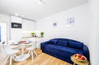Posedenie v ubytovaní Apartament 1B Niebieskie Apartamenty Poddąbie dawniej Blue Marine z basenem krytym, odkrytym, salą zabaw, animacjami