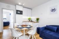 Posedenie v ubytovaní Apartament 1B Niebieskie Apartamenty Poddąbie dawniej Blue Marine z basenem krytym, odkrytym, salą zabaw, animacjami
