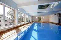 Bazén v ubytovaní Apartament 1B Niebieskie Apartamenty Poddąbie dawniej Blue Marine z basenem krytym, odkrytym, salą zabaw, animacjami alebo v jeho blízkosti