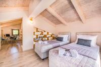 Posteľ alebo postele v izbe v ubytovaní Zante Prime Heated Pool Villas