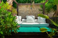 A garden outside Caballito de Mar Boutique Hotel